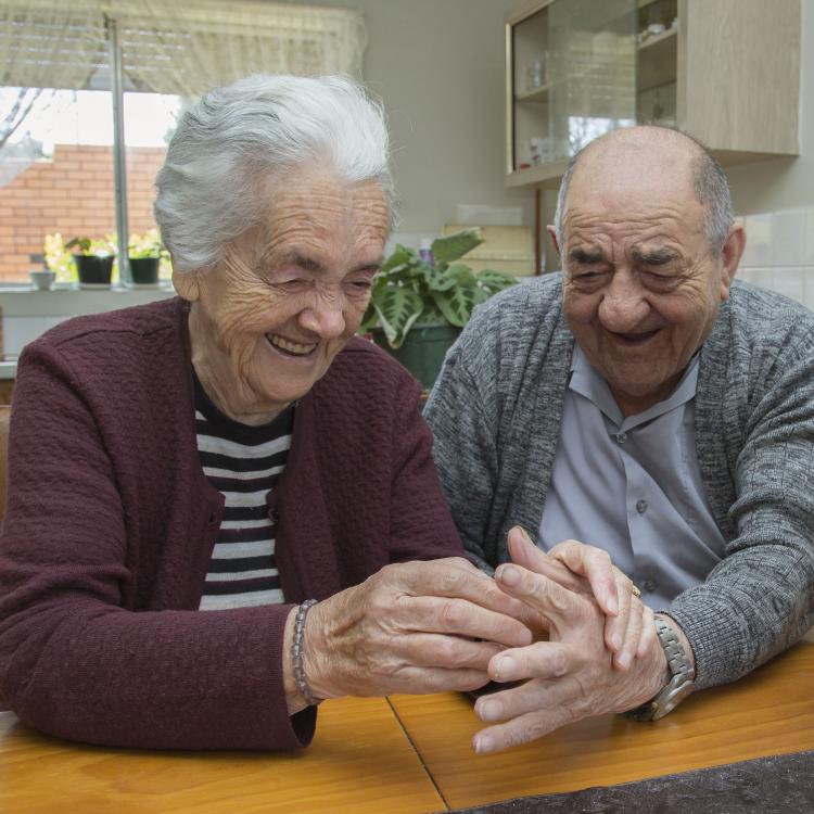 Two people laughing